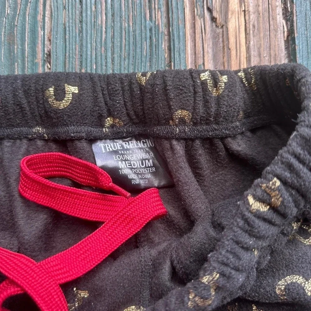 True Religion black & gold trousers